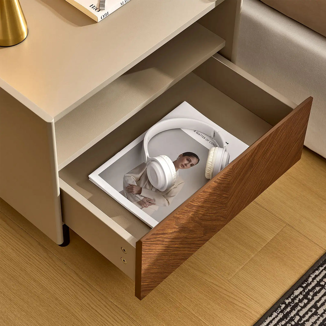 Top view of Milano Bedside Table with open drawer holding books and headphones