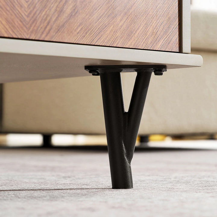 Close-up of Milano Coffee Table black painted metal legs in branch shape, reflecting natural design style