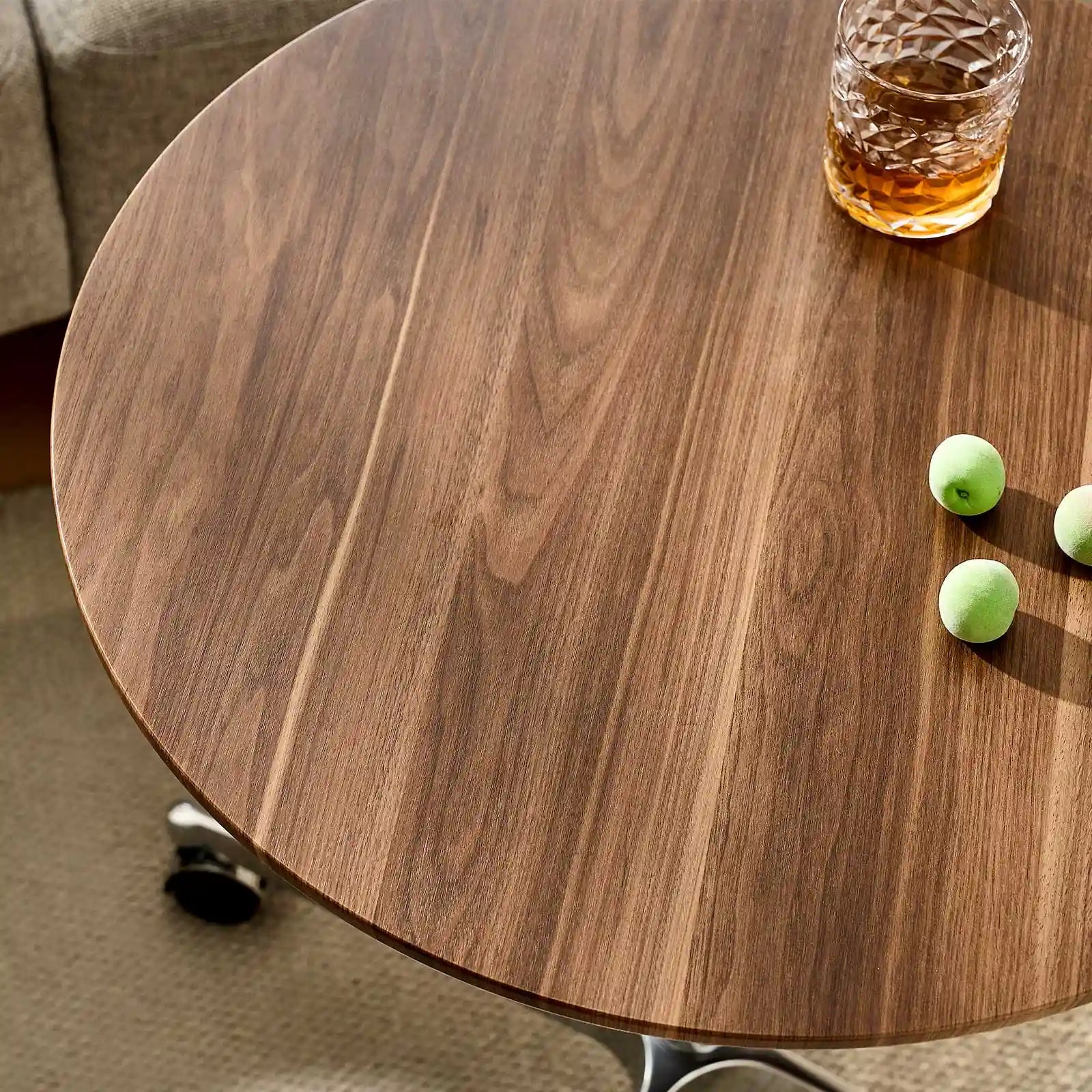 Close-up of Vesna Small Round Side Table walnut wood grain top, UK furniture with rich natural texture