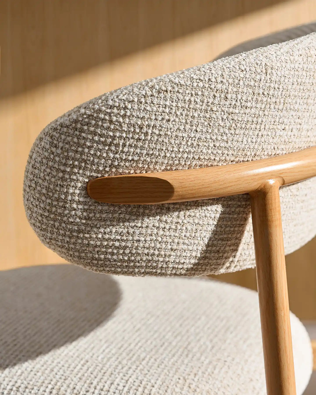 Rowan Oak Bar Stool backrest and wood-effect leg connection detail