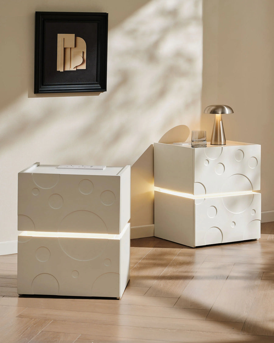Bubbli white LED bedside tables styled in a modern living room with soft contemporary decor