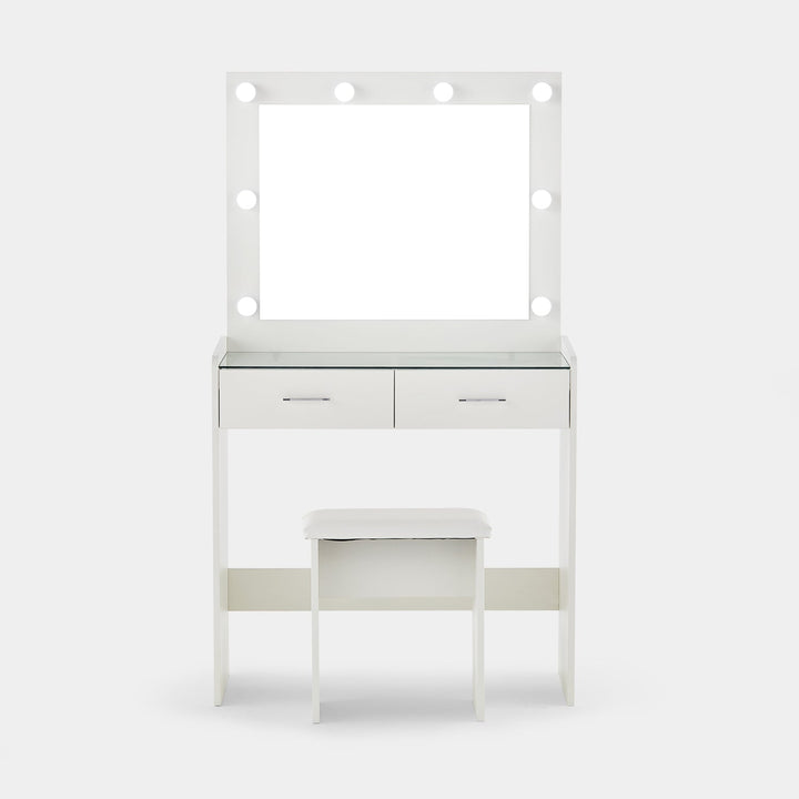 The front view of the white dressing table set, featuring a mirror, 8 LED bulbs, a glass tabletop, 2 drawers, and a stool, in a white background.