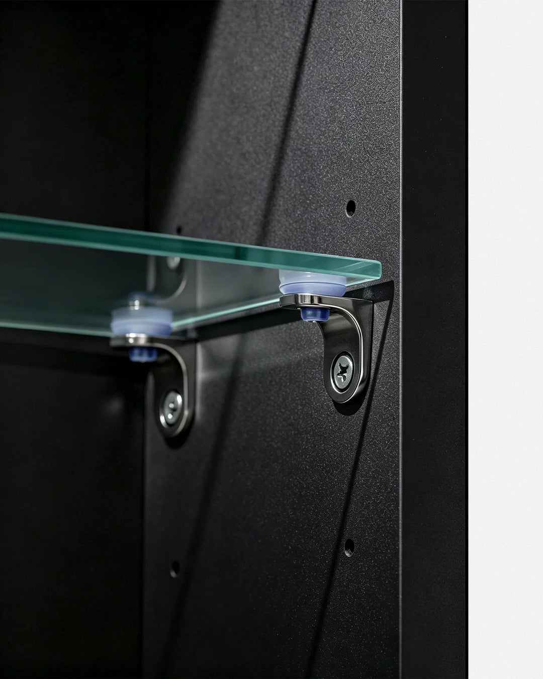 Detail of premium adjustable shelf clips inside the Arcadia arched storage cabinet.
