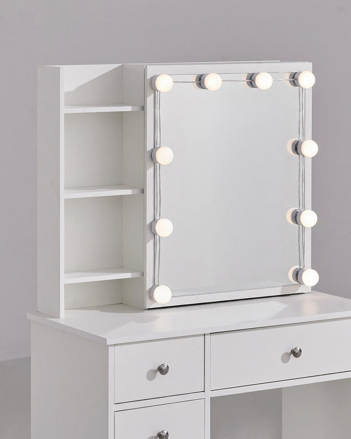 Close-up view of the dressing table, showcasing the mirror, LED bulbs, open shelves and tabletop.