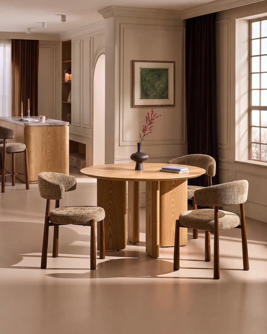Ansel Mocha Chenille Dining Chairs arranged around a round wooden dining table in a warm, contemporary dining room.