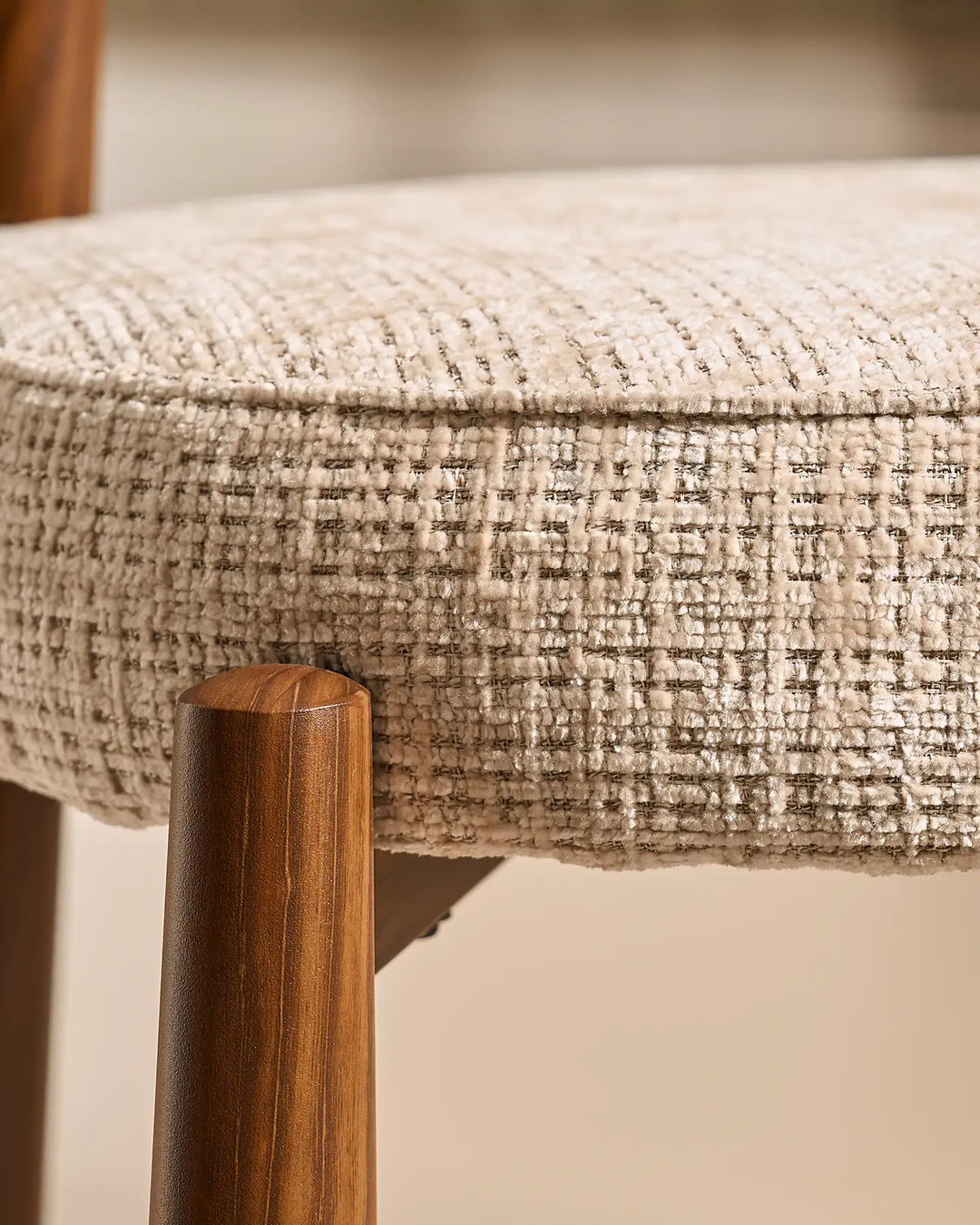 Top-down view of the Ansel Oatmeal Chenille Dining Chair highlighting its rounded upholstered seat and curved backrest.