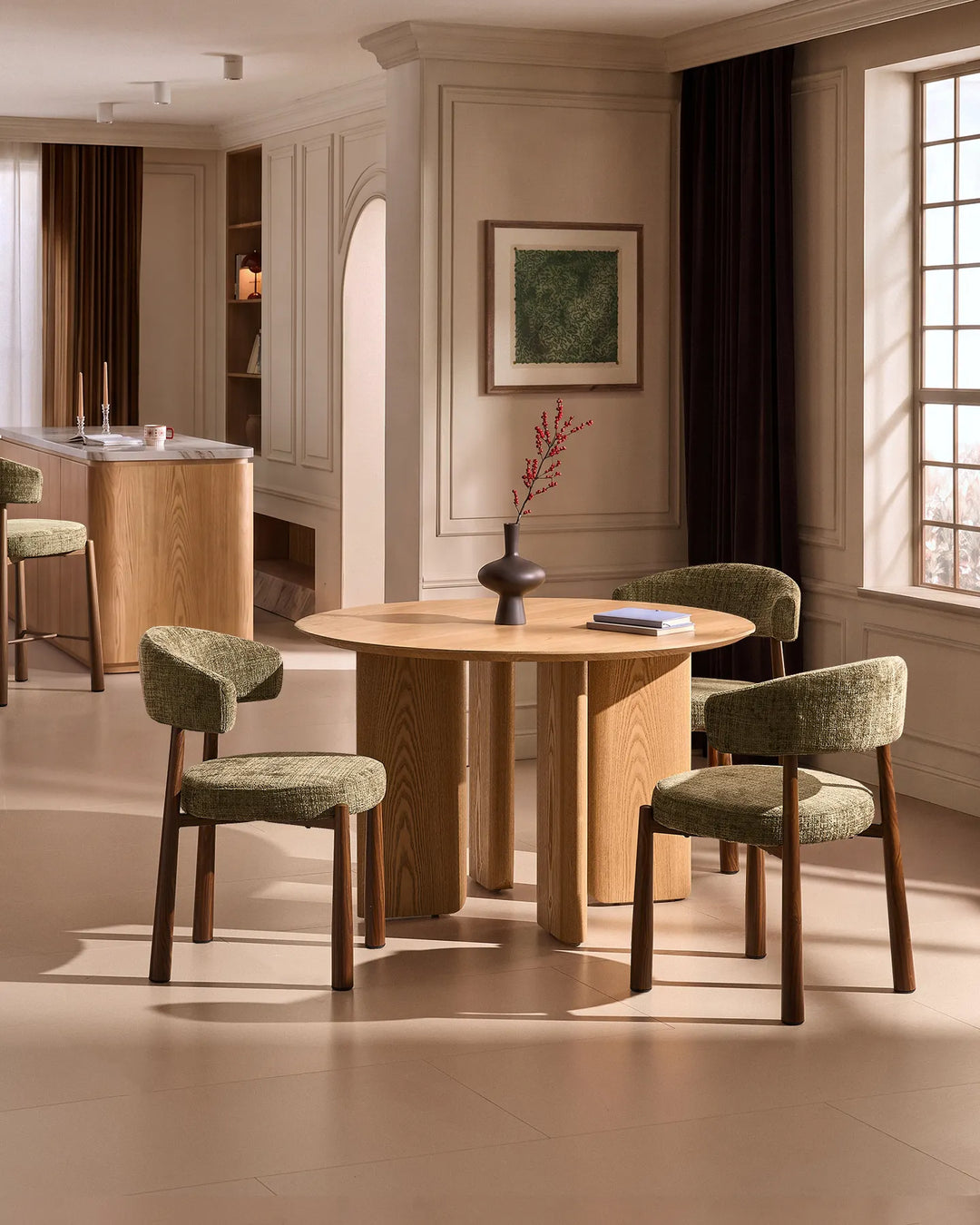 Ansel Olive Green Chenille Dining Chairs arranged around a round wooden dining table in a warm, contemporary dining room.