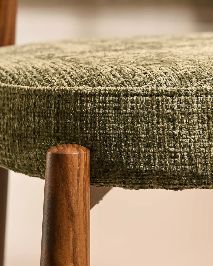 Top-down view of the Ansel Olive Green Chenille Dining Chair highlighting its rounded upholstered seat and curved backrest.