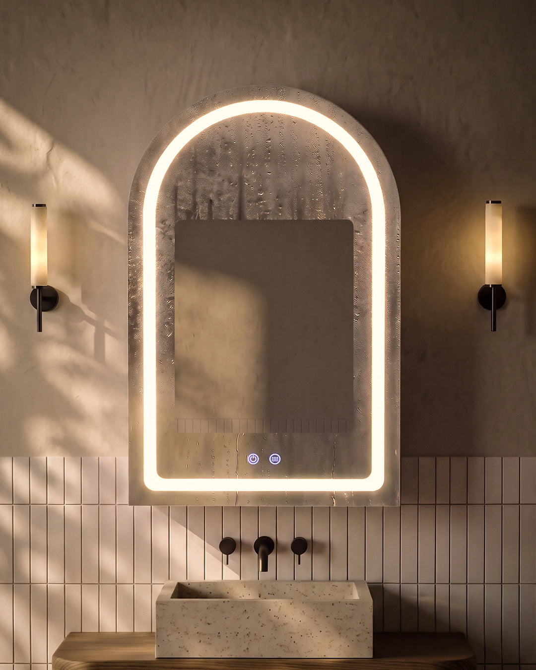 Arcadia arched LED mirror cabinet demonstrating the 30x20cm fog-free heated demister area for a crystal-clear reflection after a hot shower.