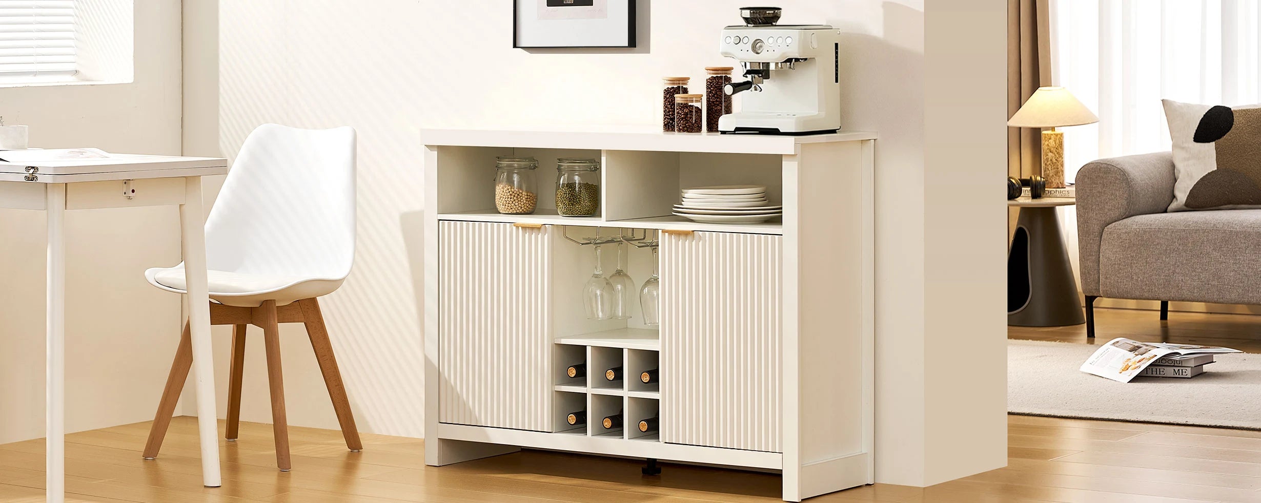 Arden Wine Bar Cabinet next to dining table with 6 bottles of wine in rack and coffee machine on top