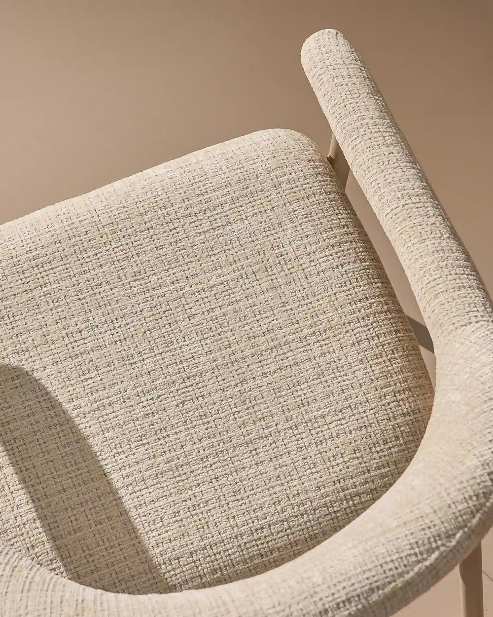 Thick padded chenille seat cushion on the Arlo Dining Chair for comfortable everyday dining