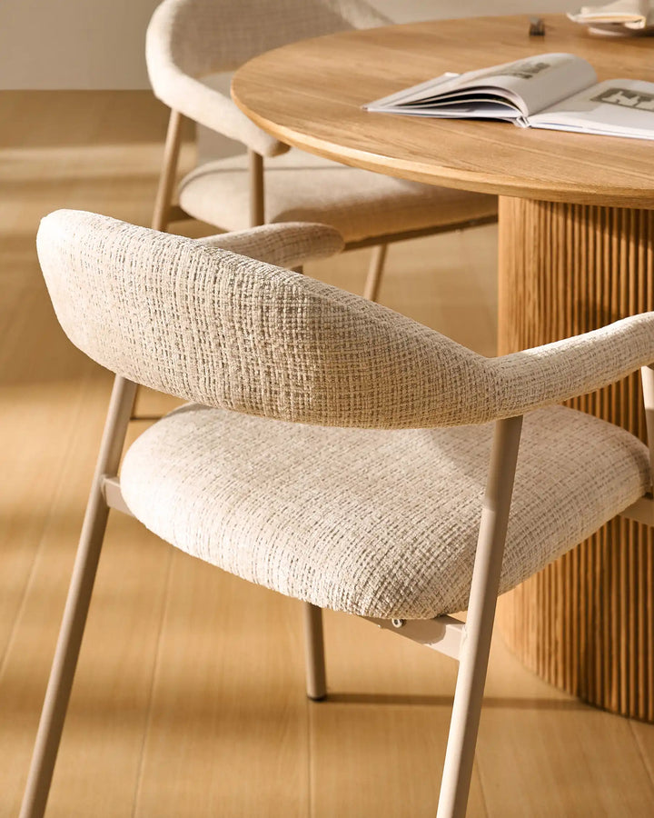 Close-up of the curved backrest on the Arlo Dining Chair with soft chenille upholstery and supportive design
