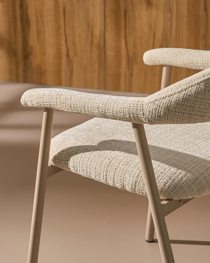 Close-up of the sculpted armrests on the Arlo Dining Chair, designed for relaxed everyday dining comfort