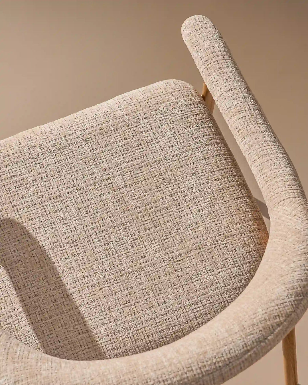 Thick padded chenille seat cushion on the Arlo Dining Chair for comfortable everyday dining