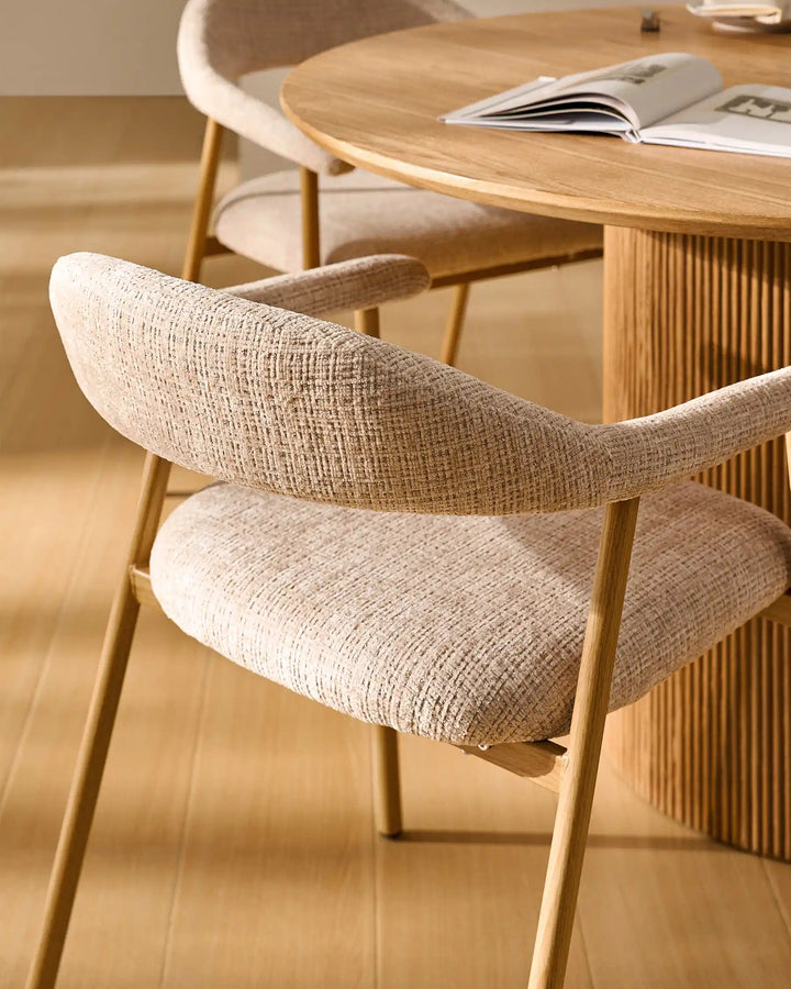 Close-up of the curved backrest on the Arlo Dining Chair with soft chenille upholstery and supportive design
