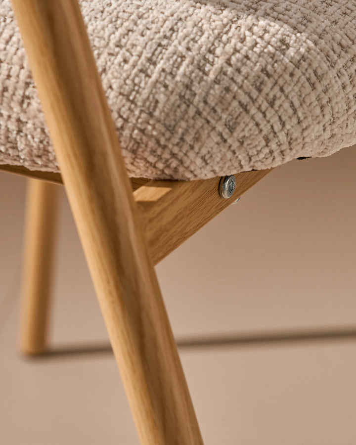 Powder-coated metal legs of the Arlo Dining Chair with a durable modern finish