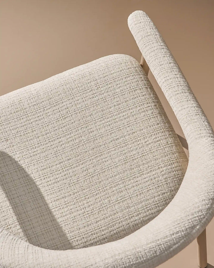 Thick padded chenille seat cushion on the Arlo Dining Chair for comfortable everyday dining