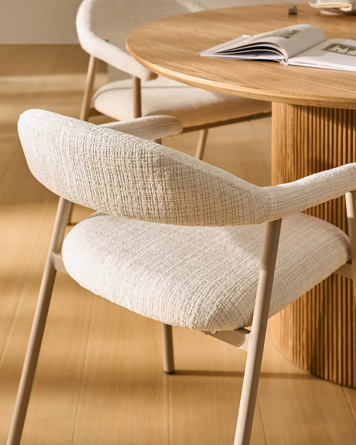 Close-up of the curved backrest on the Arlo Dining Chair with soft chenille upholstery and supportive design