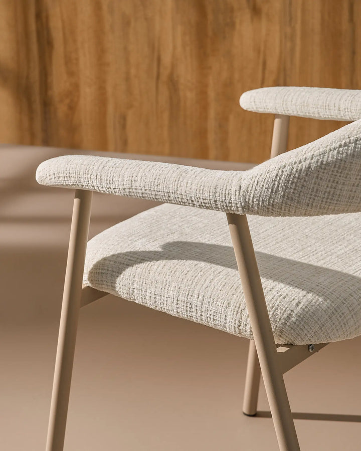 Close-up of the sculpted armrests on the Arlo Dining Chair, designed for relaxed everyday dining comfort