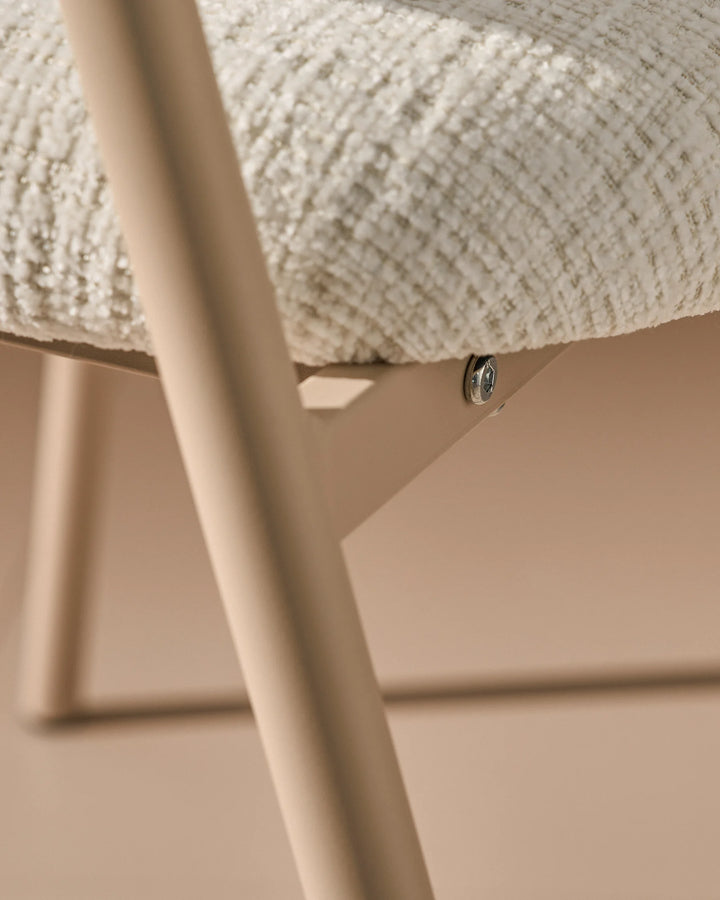 Powder-coated metal legs of the Arlo Dining Chair with a durable modern finish