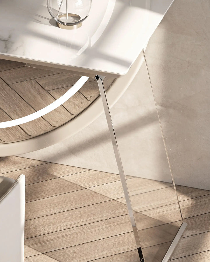 Close-up of Bellano acrylic table legs with modern transparent finish.