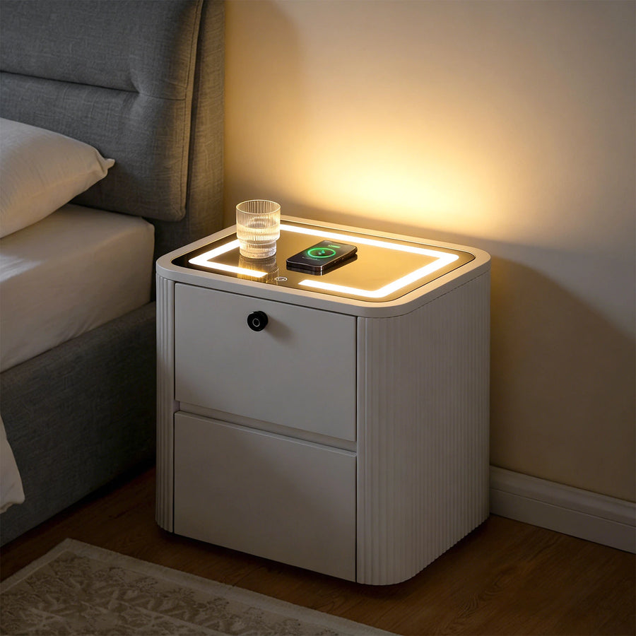 Bexley bedside table at night with LED light on and phone charging wirelessly