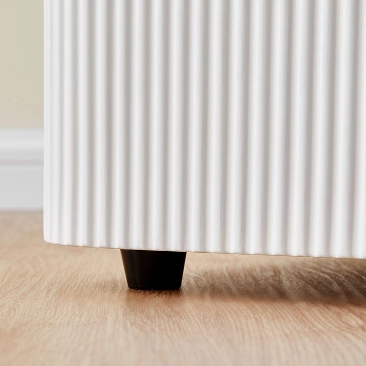 Detail of the slim metal legs on the Bexley bedside table