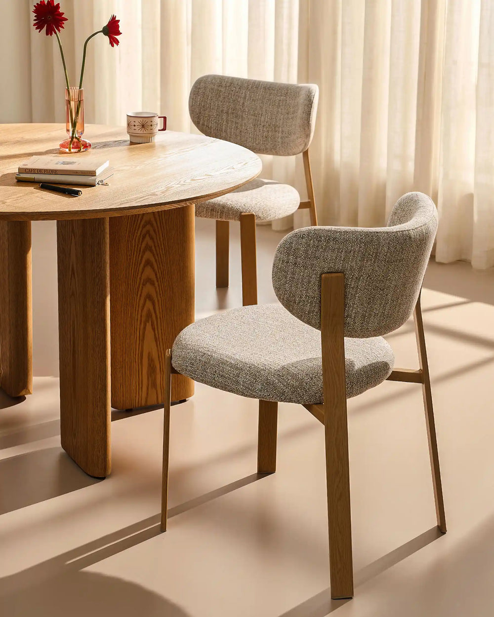 Bramley Rustic Linen Dining Chair styled beside a wooden dining table in a cosy rustic dining space