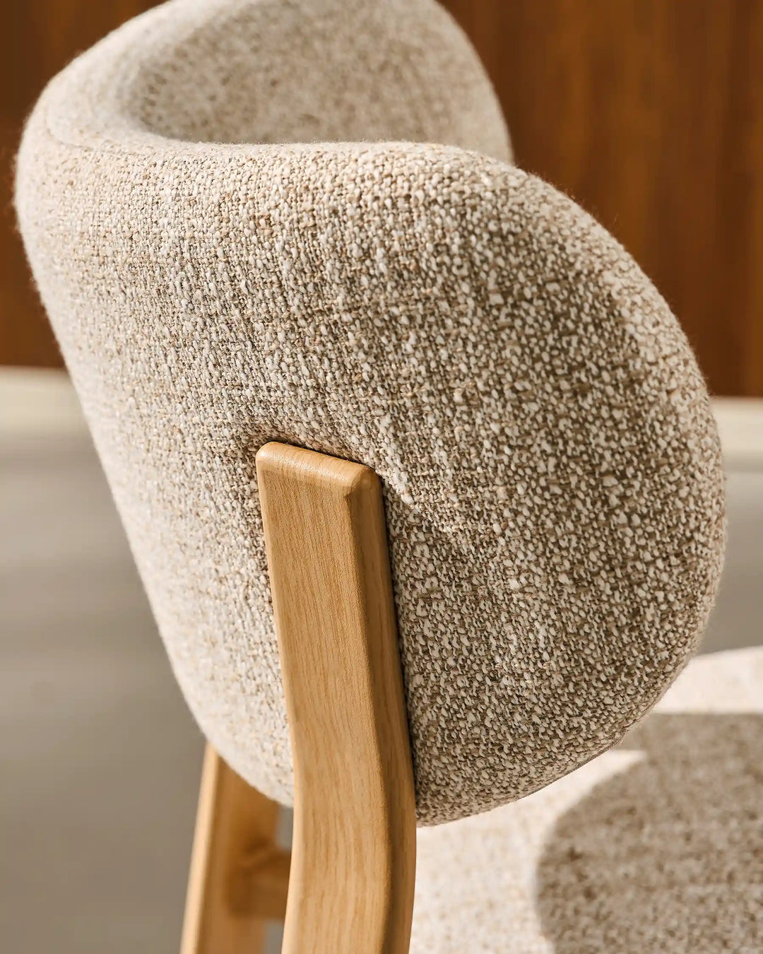 Close-up of Bramley Rustic Linen Dining Chair linen upholstery and padded backrest detail