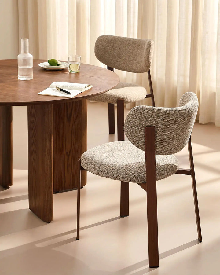 Bramley Rustic Chenille Dining Chair styled beside a wooden dining table in a cosy rustic dining space