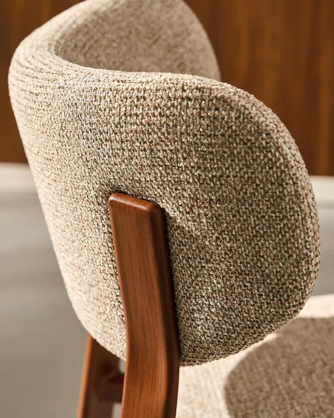 Close-up of Bramley Rustic Chenille Dining Chair chenille upholstery and padded backrest detail