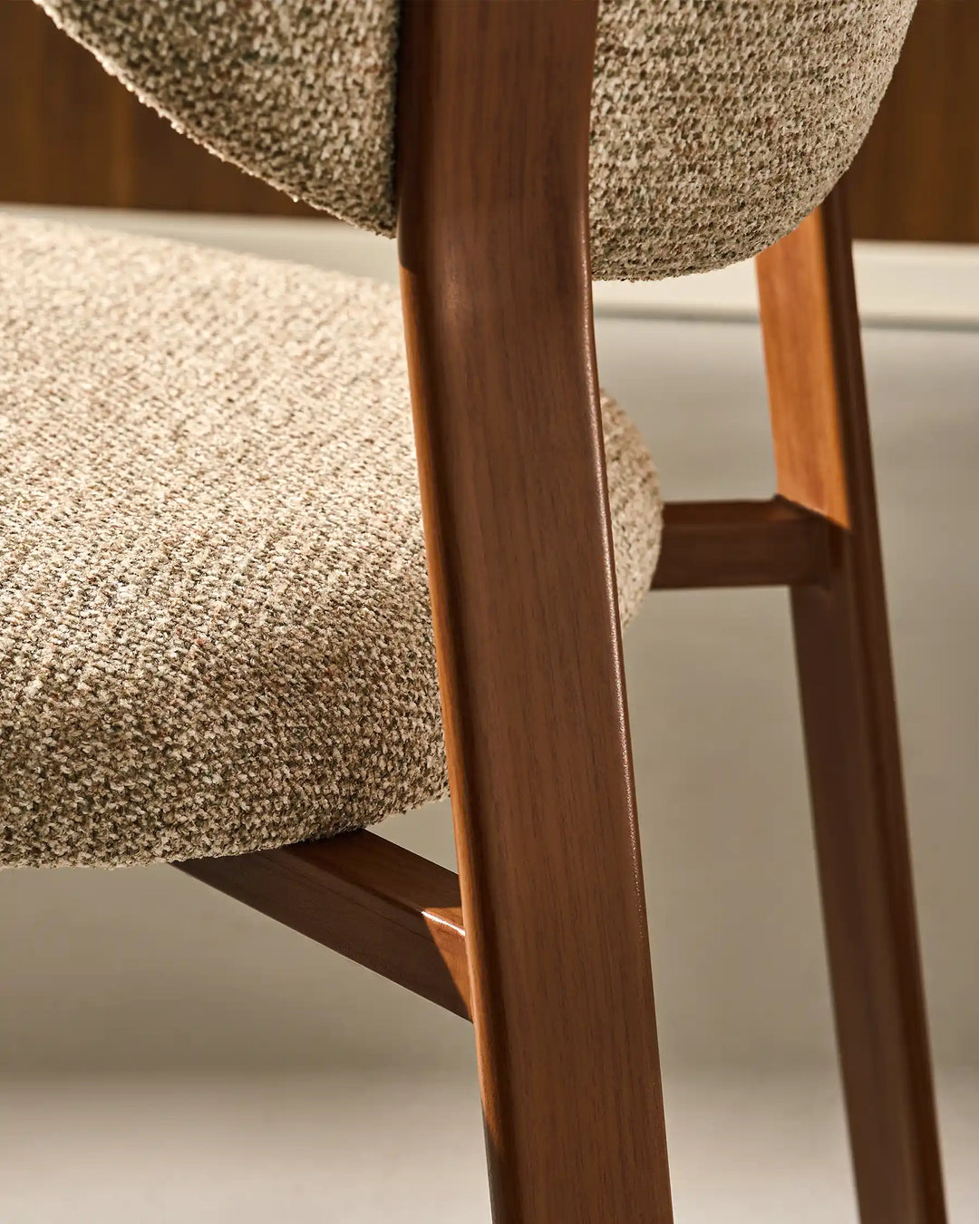 Side view of Bramley Rustic Chenille Dining Chair highlighting curved backrest design