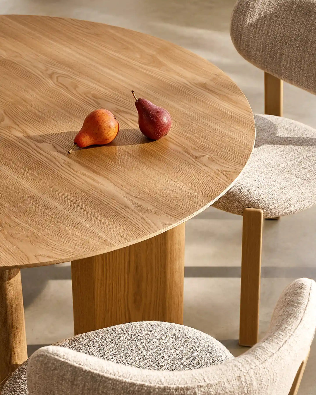Close-up overhead view of the Bramley dining table highlighting the natural oak wood grain texture