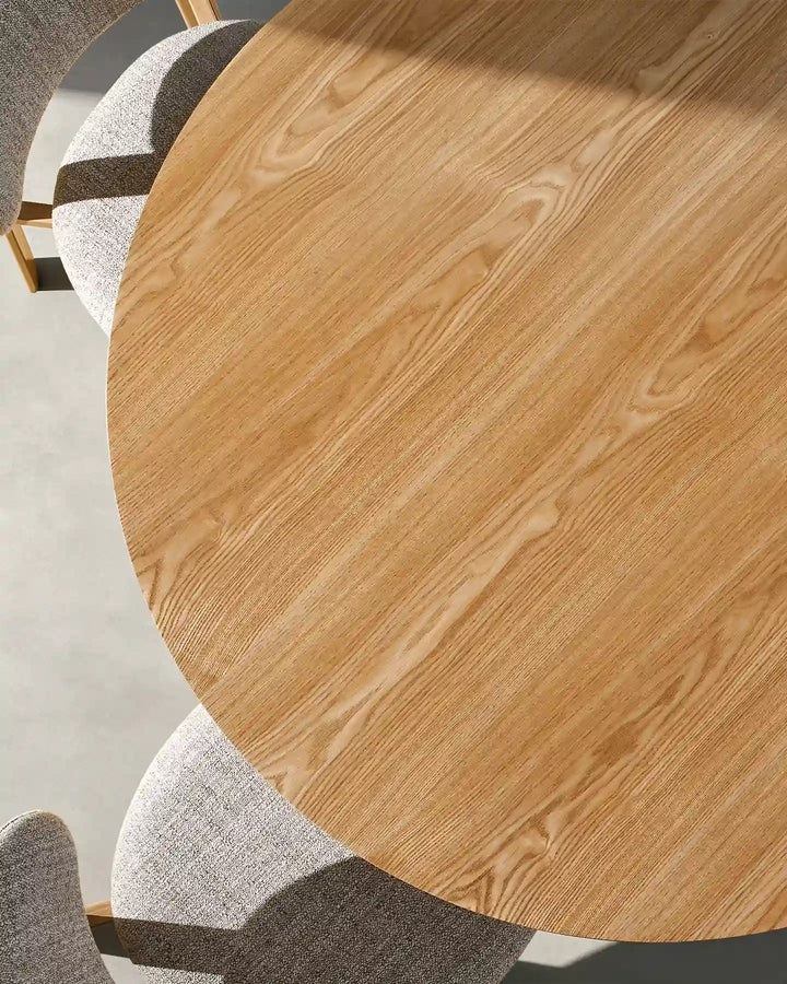 Overhead close-up of the Bramley dining table showing detailed oak wood grain and natural finish