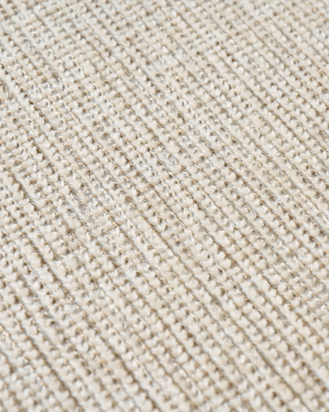 Close-up of ivory and off white chenille upholstery showing the fabric texture and natural woven finish