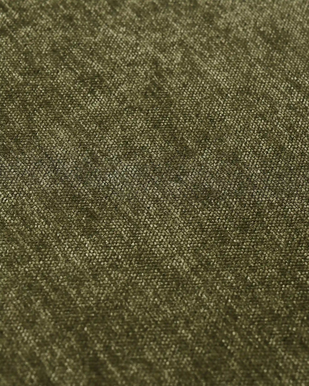Close-up of moss green chenille upholstery showing the fabric texture and natural woven finish