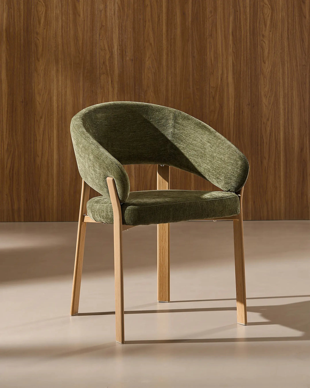 Front view of Bramley moss green and oak farmhouse dining armchair with wood effect legs