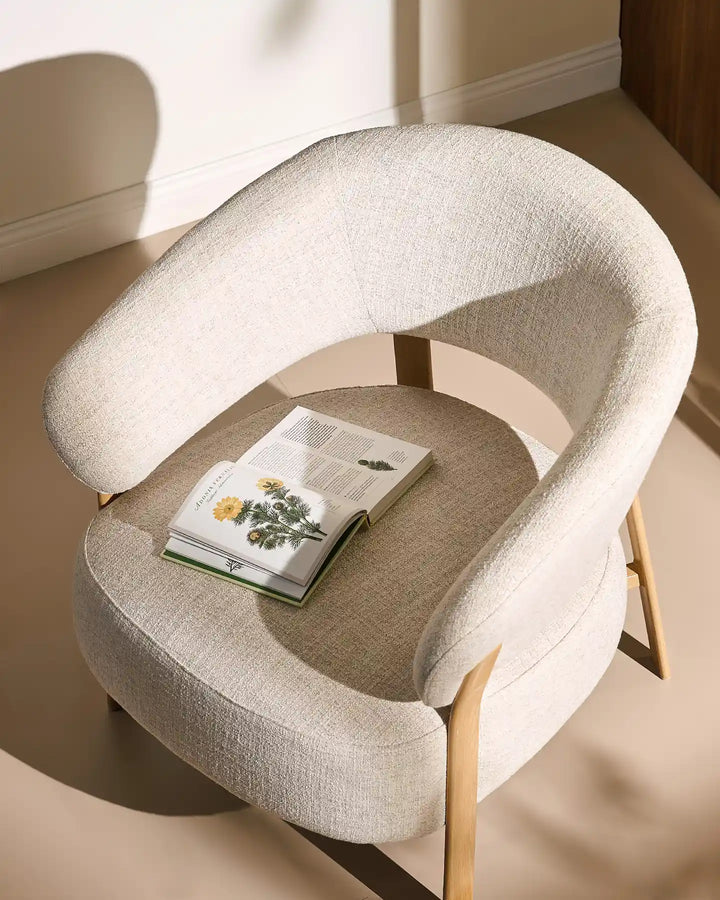Thick padded seat cushion detail of the Bramley Accent Chair in oak