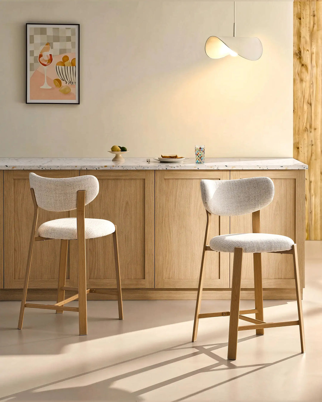 Pair of Bramley Oak Bar Stools at a kitchen breakfast bar, rustic modern farmhouse design with linen fabric upholstery