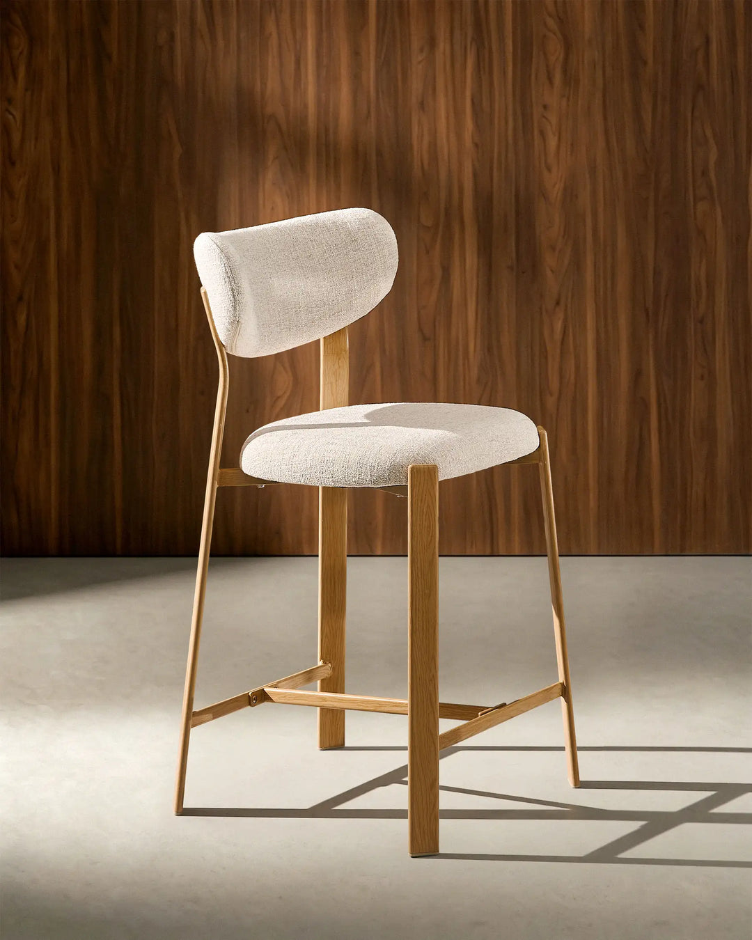 Angled view of Bramley Oak Bar Stool with rustic linen upholstery and oak wood effect legs