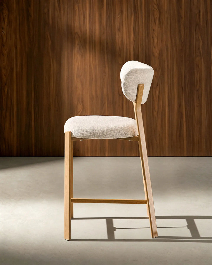 Side view of Bramley Oak Bar Stool with curved backrest and wood effect legs