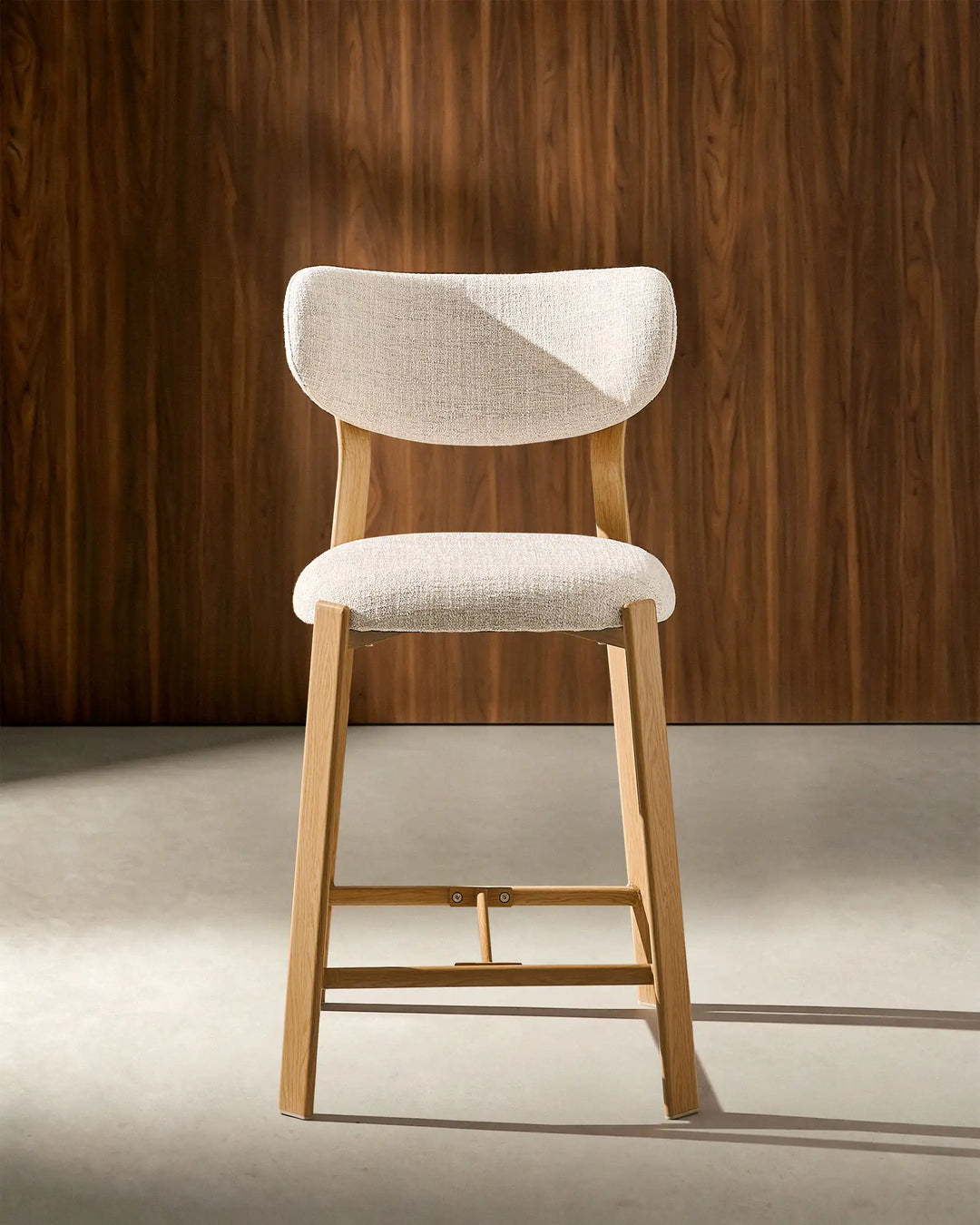 Front view of Bramley Oak Bar Stool featuring linen fabric upholstery and modern farmhouse styling