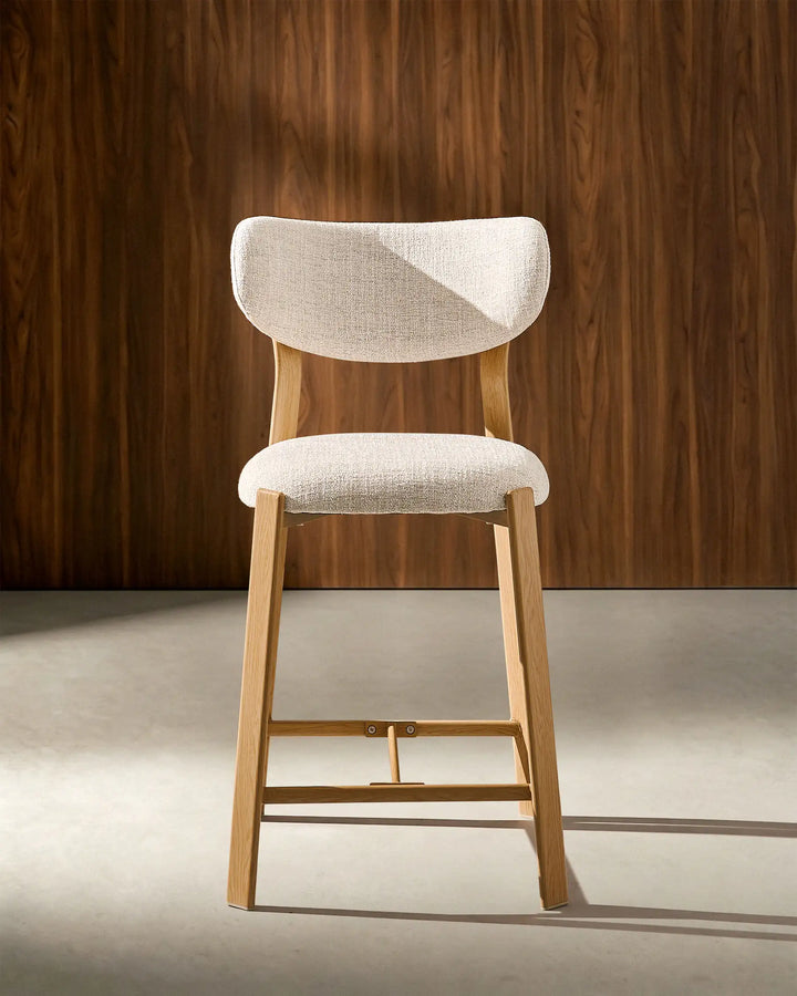 Front view of Bramley Oak Bar Stool featuring linen fabric upholstery and modern farmhouse styling