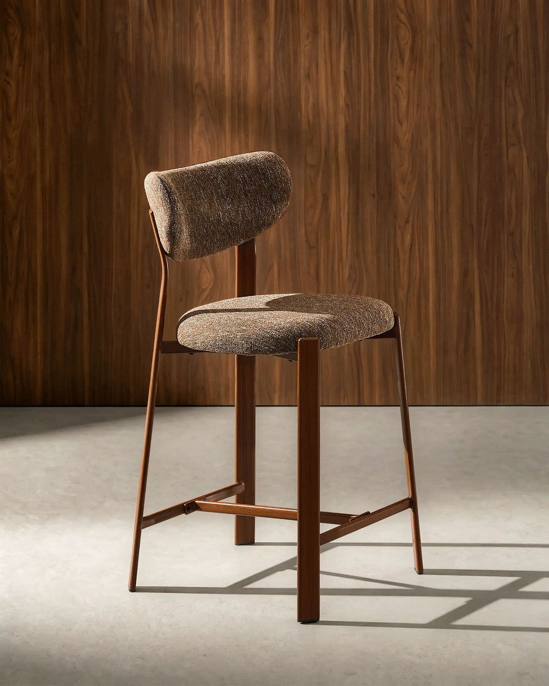 Angled view of Bramley Walnut Bar Stool with rustic linen upholstery and walnut wood effect legs