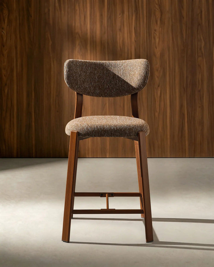 Front view of Bramley Walnut Bar Stool featuring linen fabric upholstery and modern farmhouse design