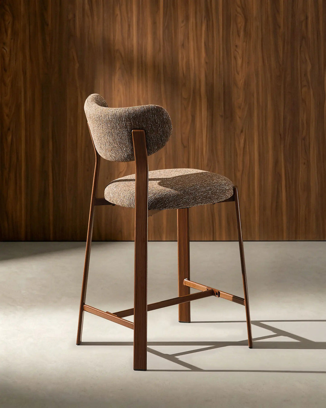 Rear view of Bramley Walnut Bar Stool showing curved back design and wood effect frame