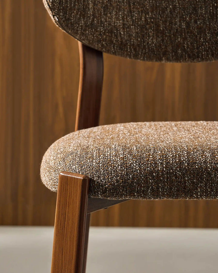 Thick padded seat detail of Bramley Walnut Bar Stool with comfortable linen fabric upholstery