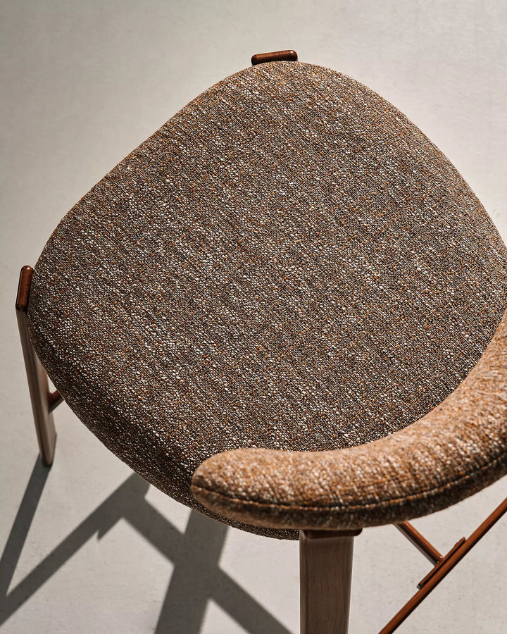 Top view of Bramley Walnut Bar Stool highlighting spacious upholstered seat and linen texture
