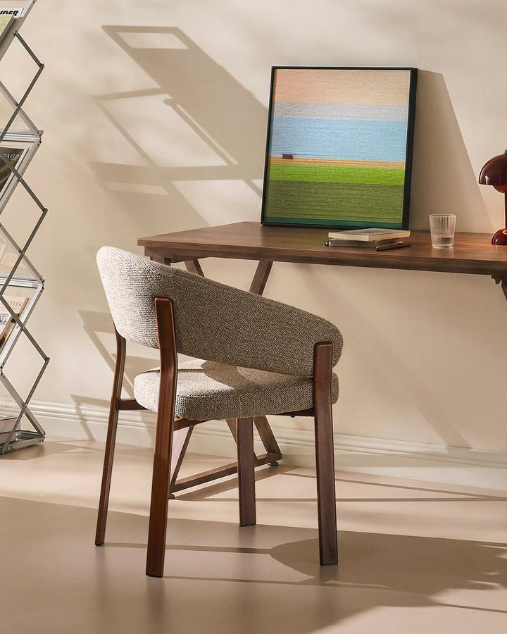 Bramley  walnut upholstered armchair used as a rustic desk chair in a relaxed home office