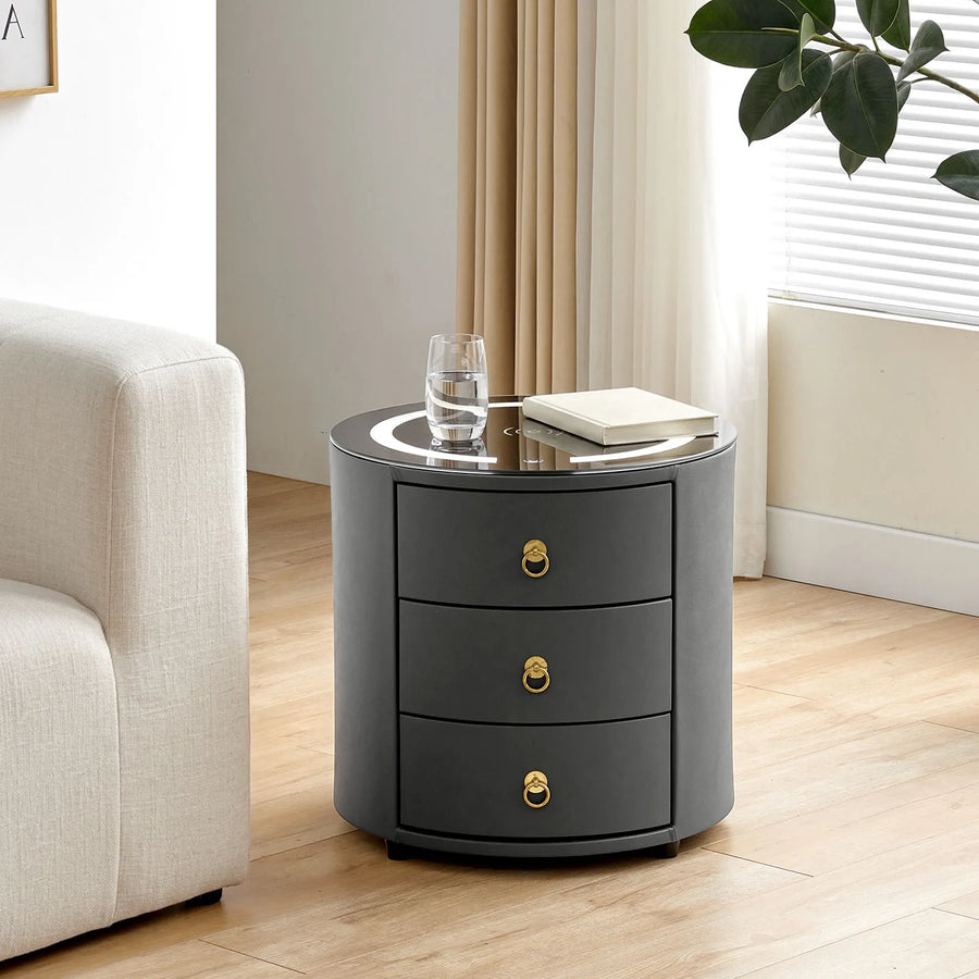 Brookline grey smart bedside table in a modern living room beside the sofa during the day.